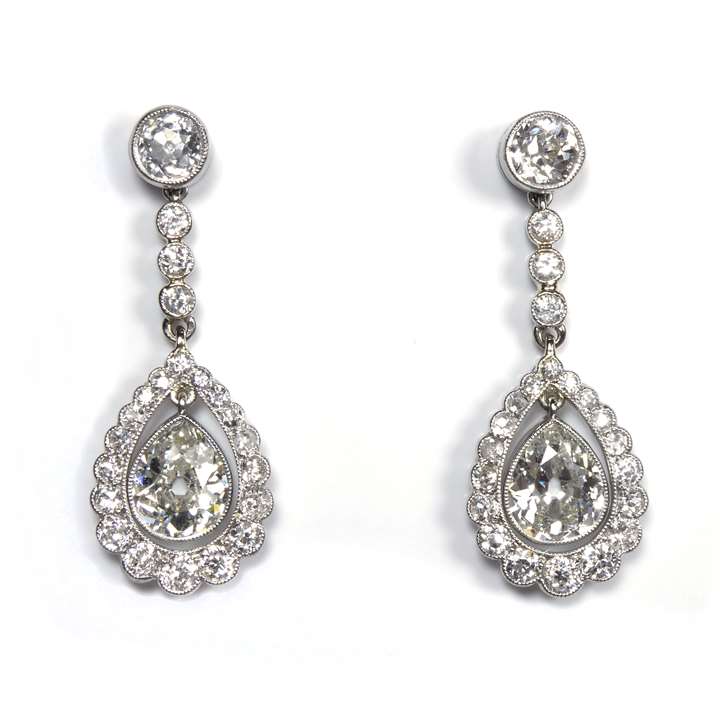 Pair of diamond drop earrings Centre drop with diamond surround